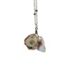 Pièce unique. Collier fait main. Coquillage, œil de Sainte-Lucie et verre poli.
Création artisanale corse.