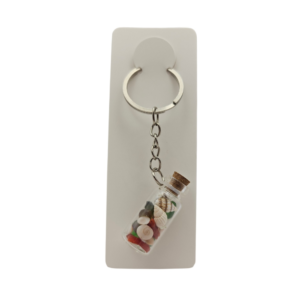 Porte-clés fiole "Mille et un trésors" avec corail corse véritable et plusieurs yeux de Sainte-Lucie. Création artisanale corse.