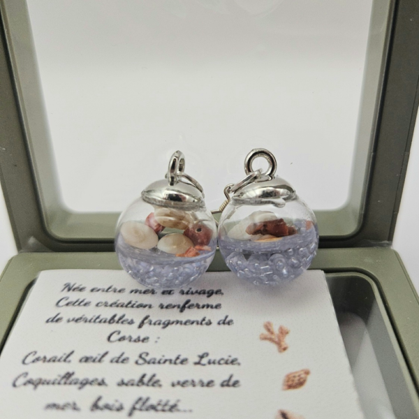 Pièces uniques. Boucles d'oreilles faites main. Corail corse véritable, œil de Sainte-Lucie et coquillages.
Création artisanale corse.