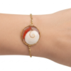 Pièce unique. Bracelet réglable fait main. Véritable corail et œil de Sainte-Lucie.
Création artisanale corse.