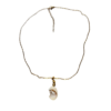 Pièce unique. Collier fait main. Véritable œil de Sainte-Lucie et coquillage.
Création artisanale corse.