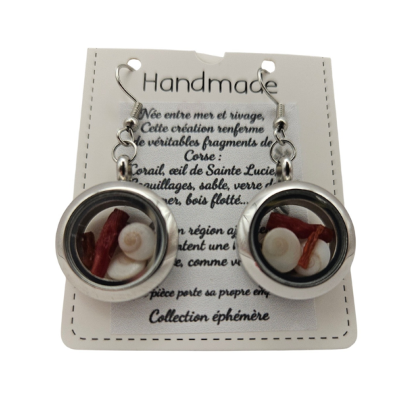 Pièces uniques. Boucles d'oreilles faites main. Véritable corail et œil de Sainte-Lucie.
Création artisanale corse.