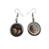Pièces uniques. Boucles d'oreilles faites main. Véritable corail et œil de Sainte-Lucie.
Création artisanale corse.
