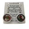 Pièces uniques. Boucles d'oreilles faites main. Véritable corail et œil de Sainte-Lucie.
Création artisanale corse.