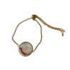 Pièce unique. Bracelet réglable fait main. Véritable corail et œil de Sainte-Lucie.
Création artisanale corse.