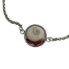 Pièce unique. Bracelet réglable fait main. Véritable corail et œil de Sainte-Lucie.
Création artisanale corse.