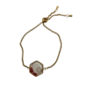 Pièce unique. Bracelet réglable fait main. Véritable corail et œil de Sainte-Lucie.
Création artisanale corse.
