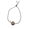 Pièce unique. Bracelet réglable fait main. Véritable corail et œil de Sainte-Lucie.
Création artisanale corse.
